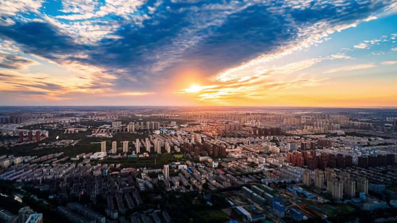 辽宁沈阳城市风景航拍日落晚霞天空延时摄影视频素材