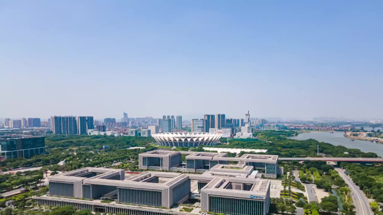 佛山新城CBD和世纪莲体育中心城市天际线晴天延时航拍视频素材