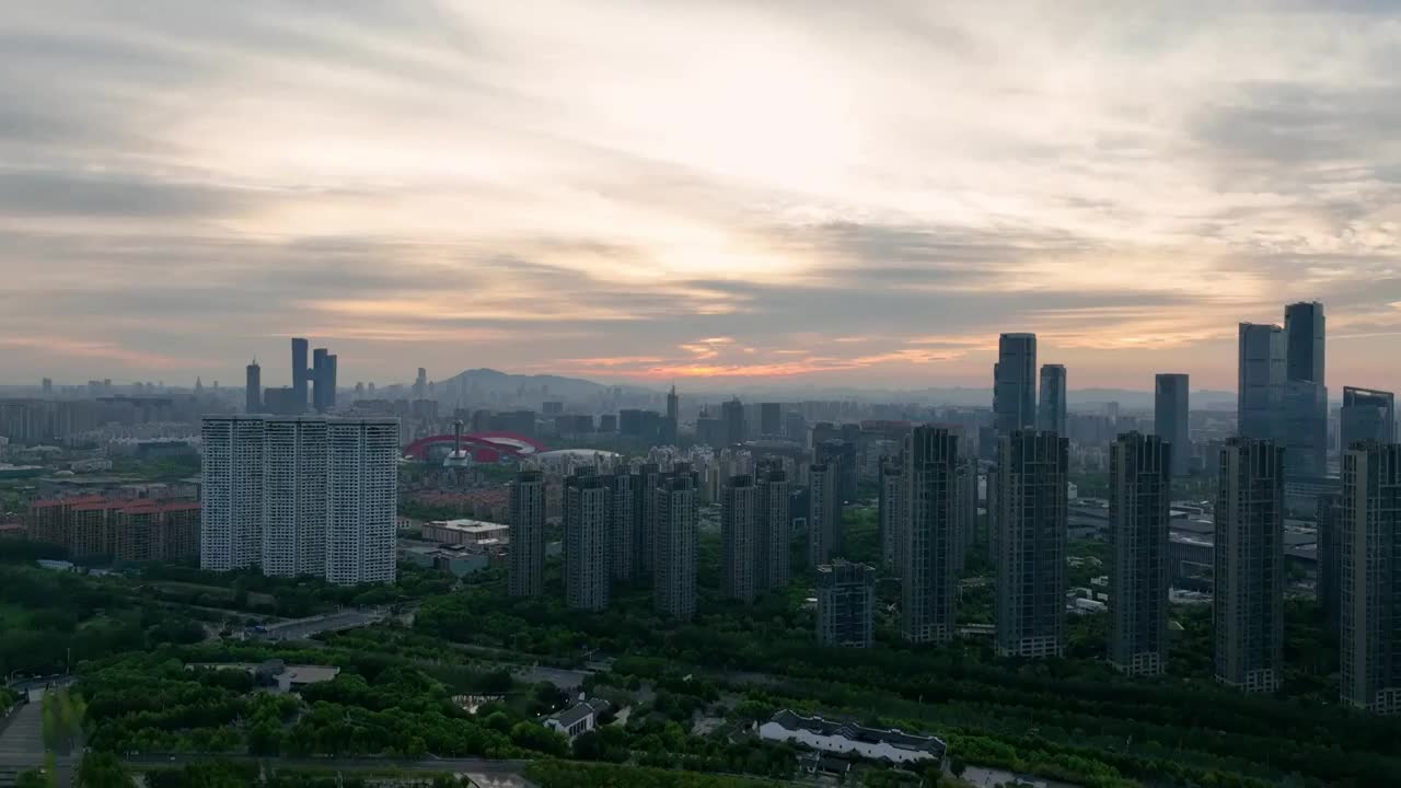 航拍日出朝霞下的南京河西中心商务区视频素材