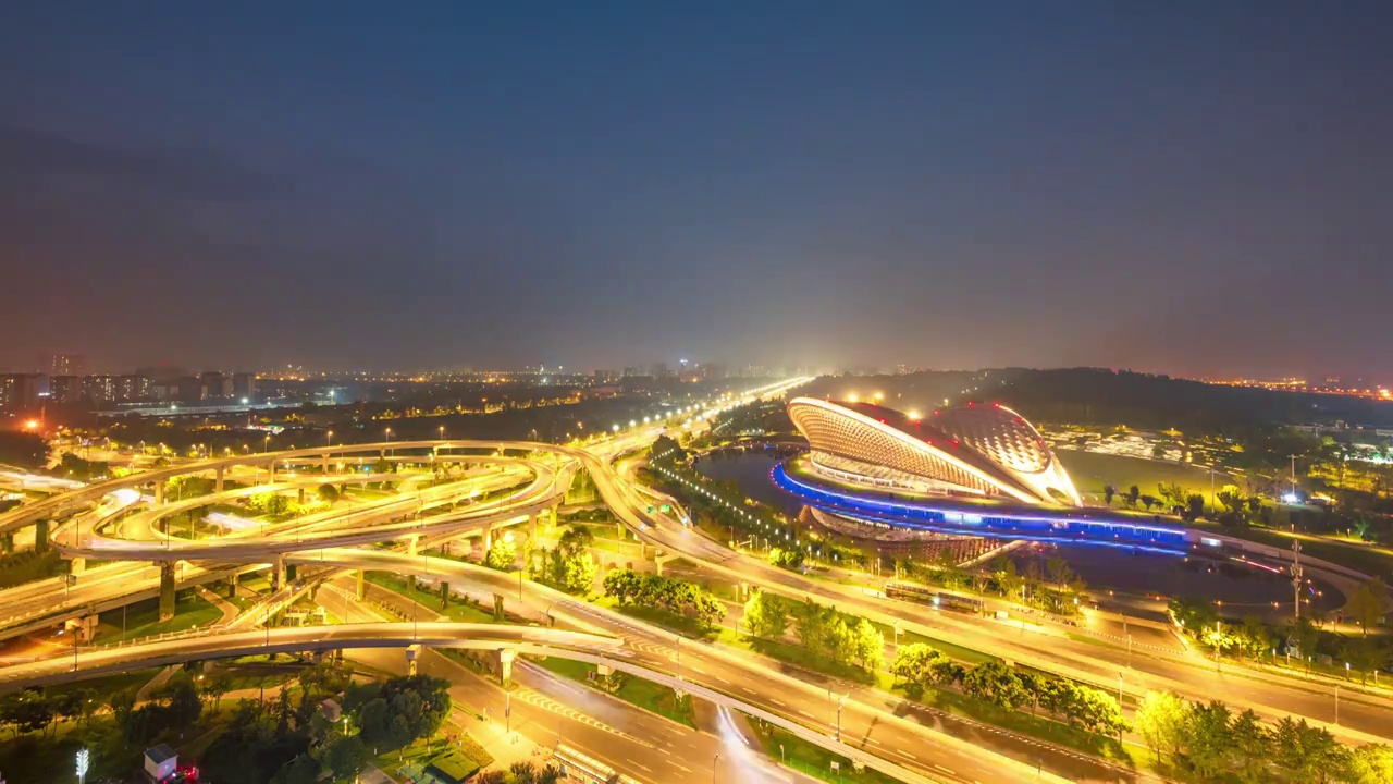 成都三环凤凰立交和露天音乐公园高视角城市风光夜景延时摄影视频素材