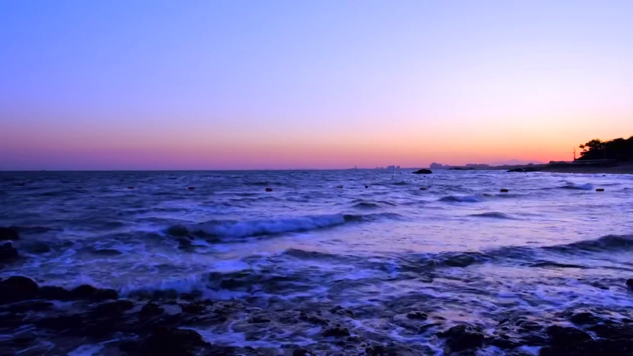 秦皇岛沙滩海浪与夕阳落日自然风光视频素材