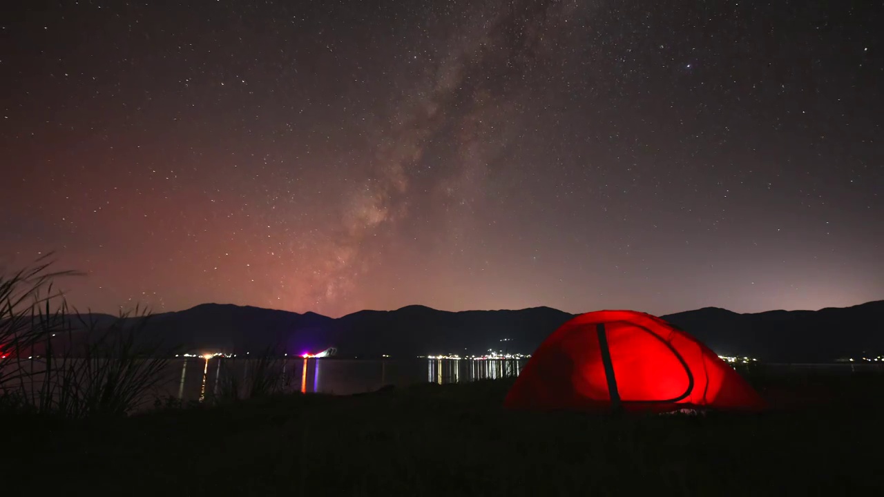 丽江程海露营星空延时视频素材