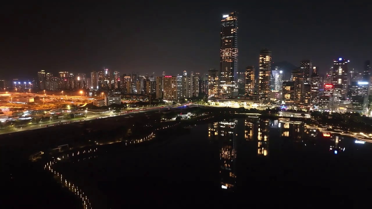 广东省深圳市南山区深圳湾一号华润大厦人才公园夜景航拍视频素材