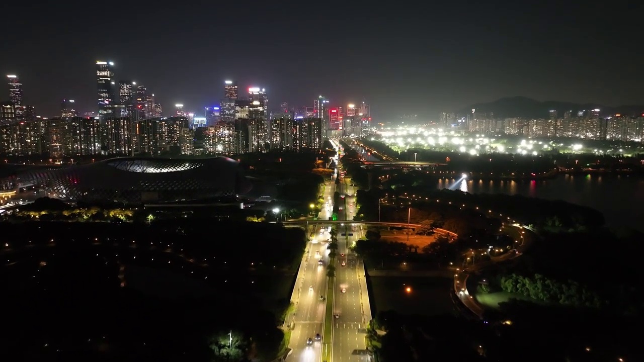 广东省深圳市南山区深圳湾一号华润大厦人才公园夜景航拍视频素材