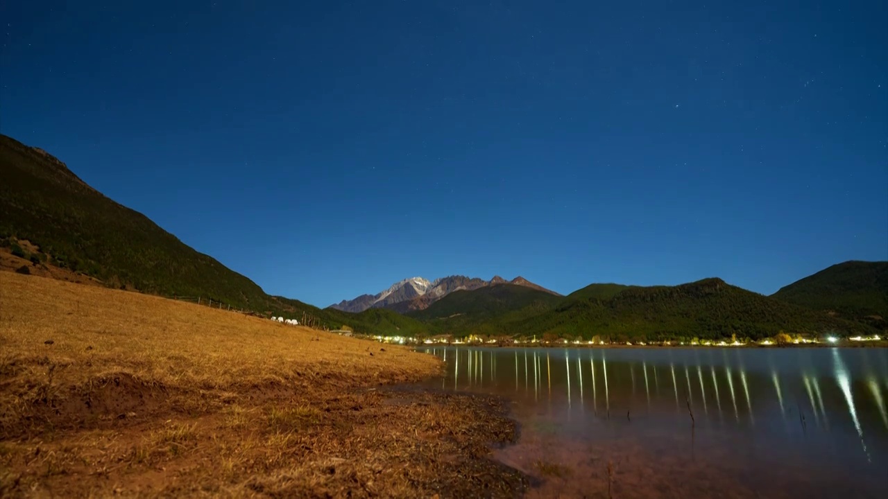 玉龙雪山星空日照金山延时视频素材