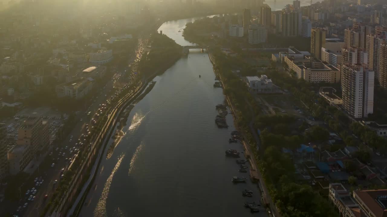 航拍海口市区海甸河落日延迟视频素材