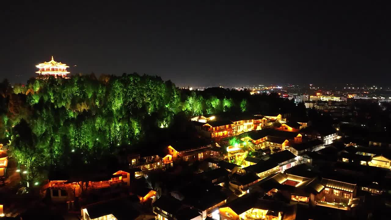 航拍空中鸟瞰云南丽江古城夜景灯光视频素材