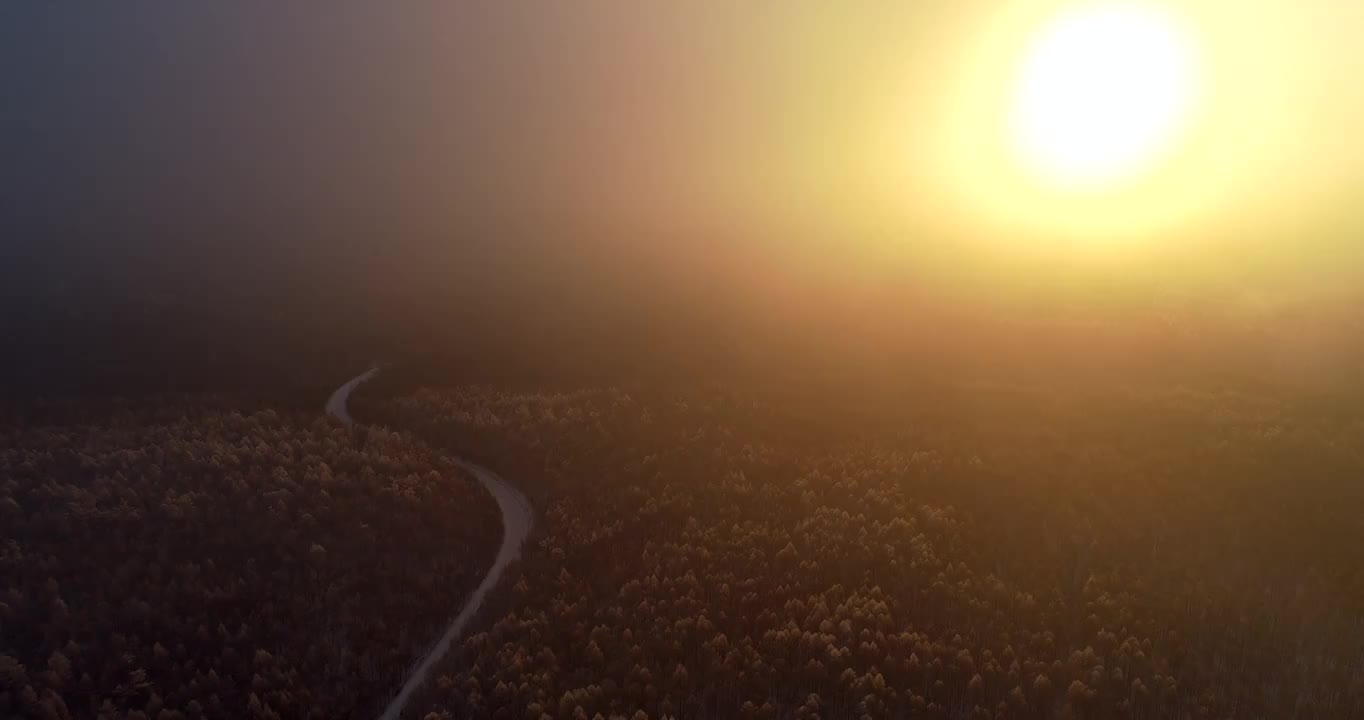 航拍冬季山林雾凇晨雾朝阳视频素材