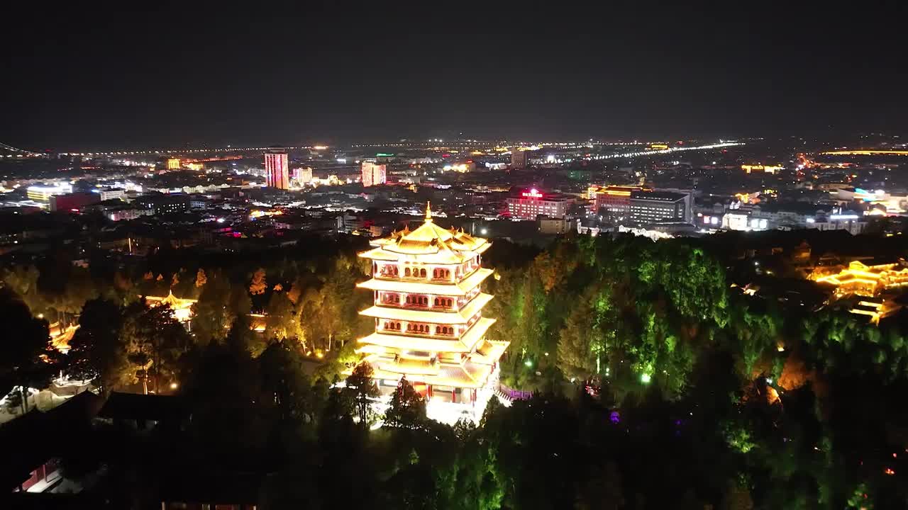 航拍空中鸟瞰云南丽江古城夜景灯光视频素材