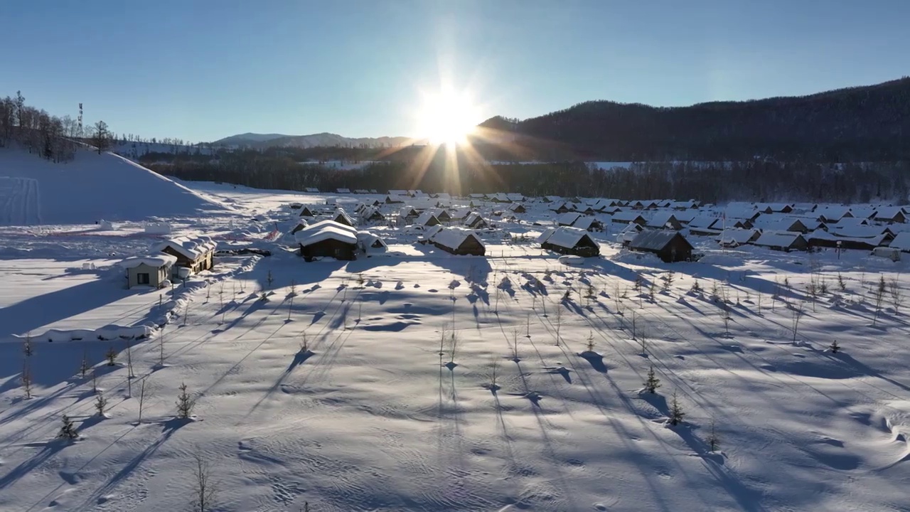 航拍冬季禾木村日出视频素材