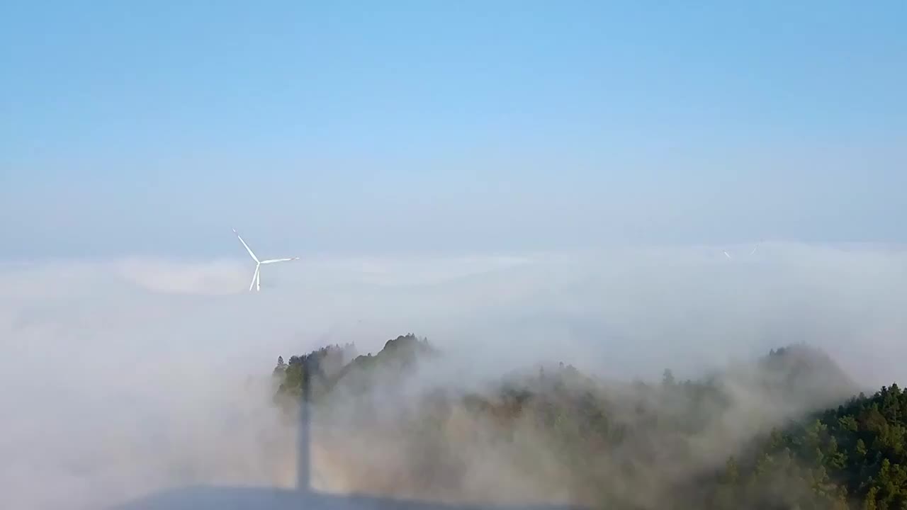 竹麻山云海风车延时视频素材