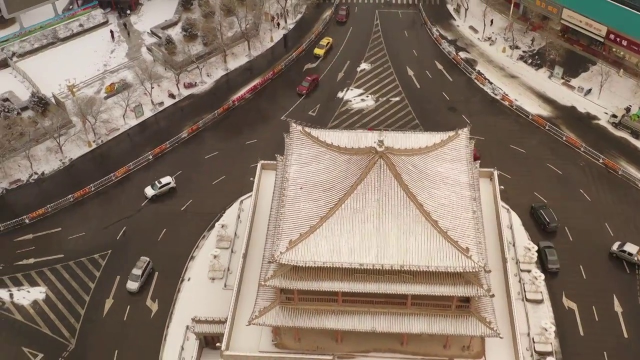 张掖鼓楼航拍雪景旋转视频素材