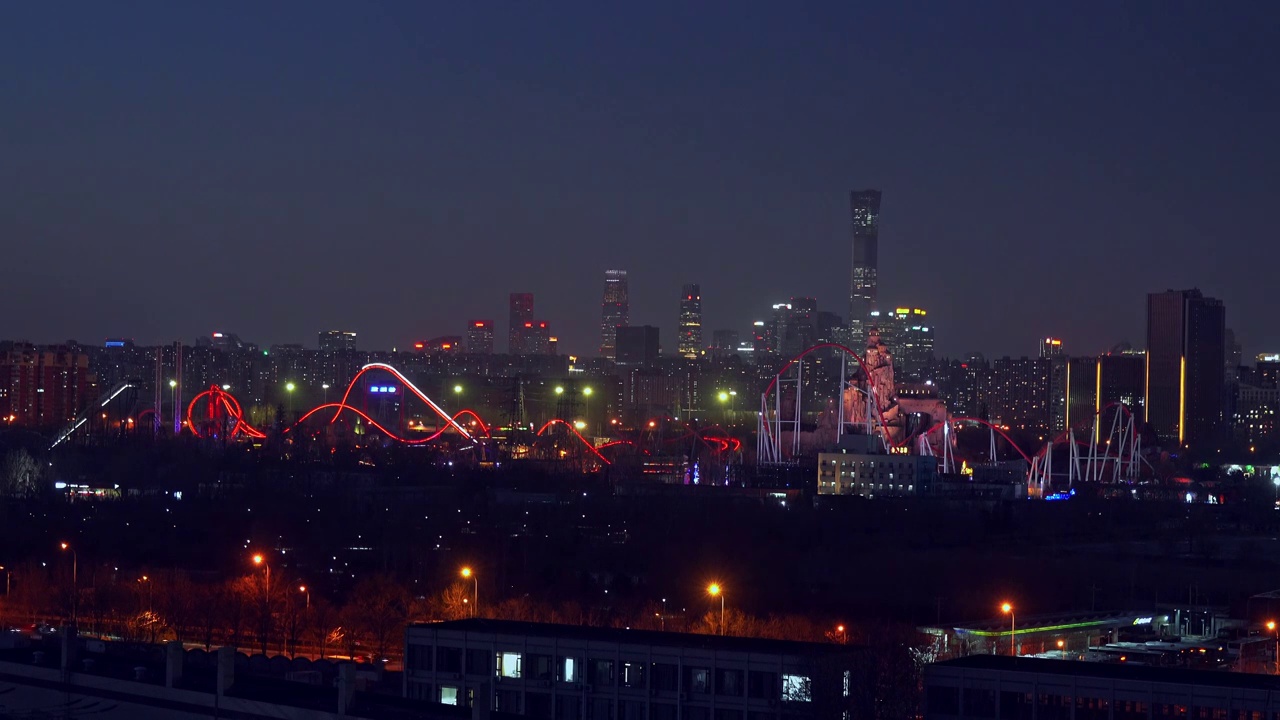 北京国贸CBD与欢乐谷同框夜景视频素材