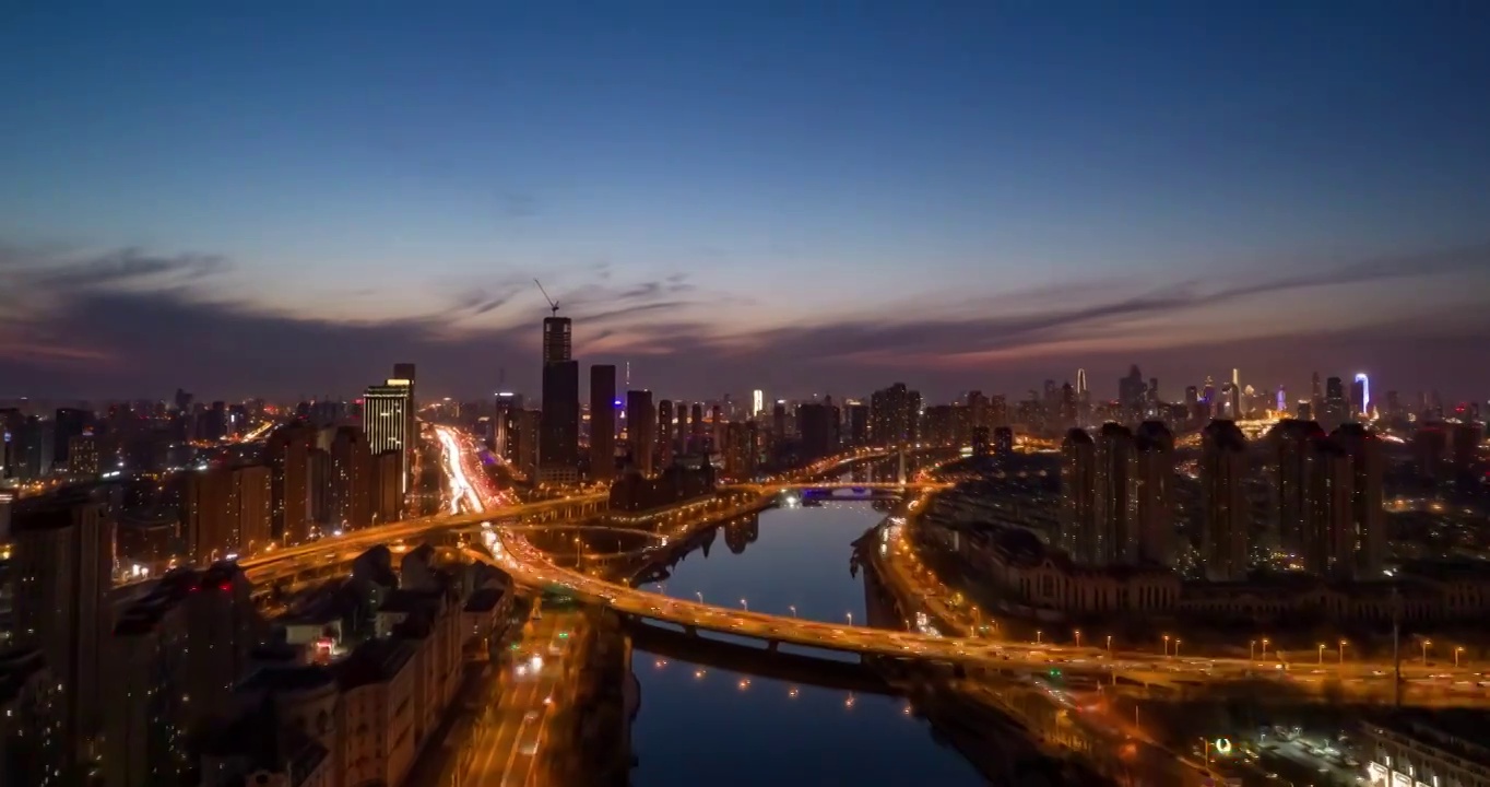 日落晚霞天津海河海津大桥城市夜景街道高空延时航拍视频素材