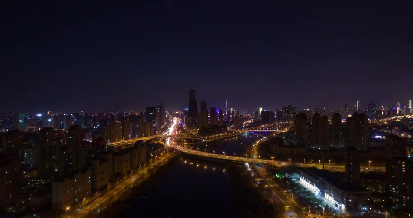 日落晚霞天津海河海津大桥城市夜景街道高空延时航拍视频素材