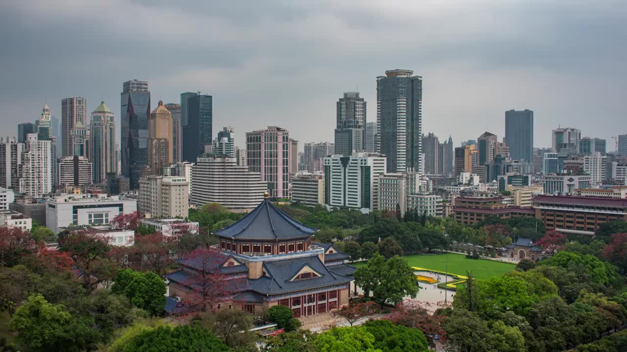 广州中山纪念堂木棉花开日转夜延时视频素材