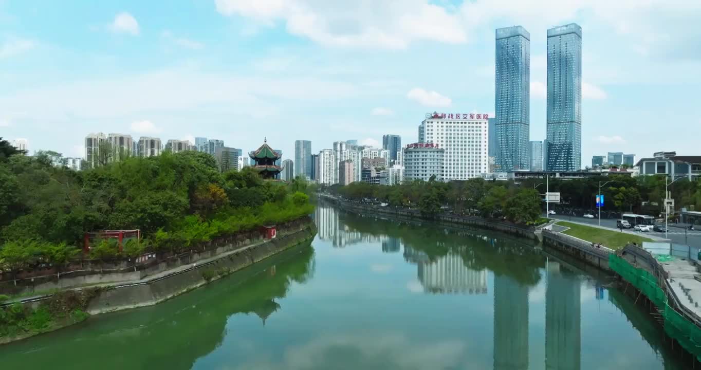 航拍延时成都锦江两岸城市倒映水中蓝天白云高楼视频素材