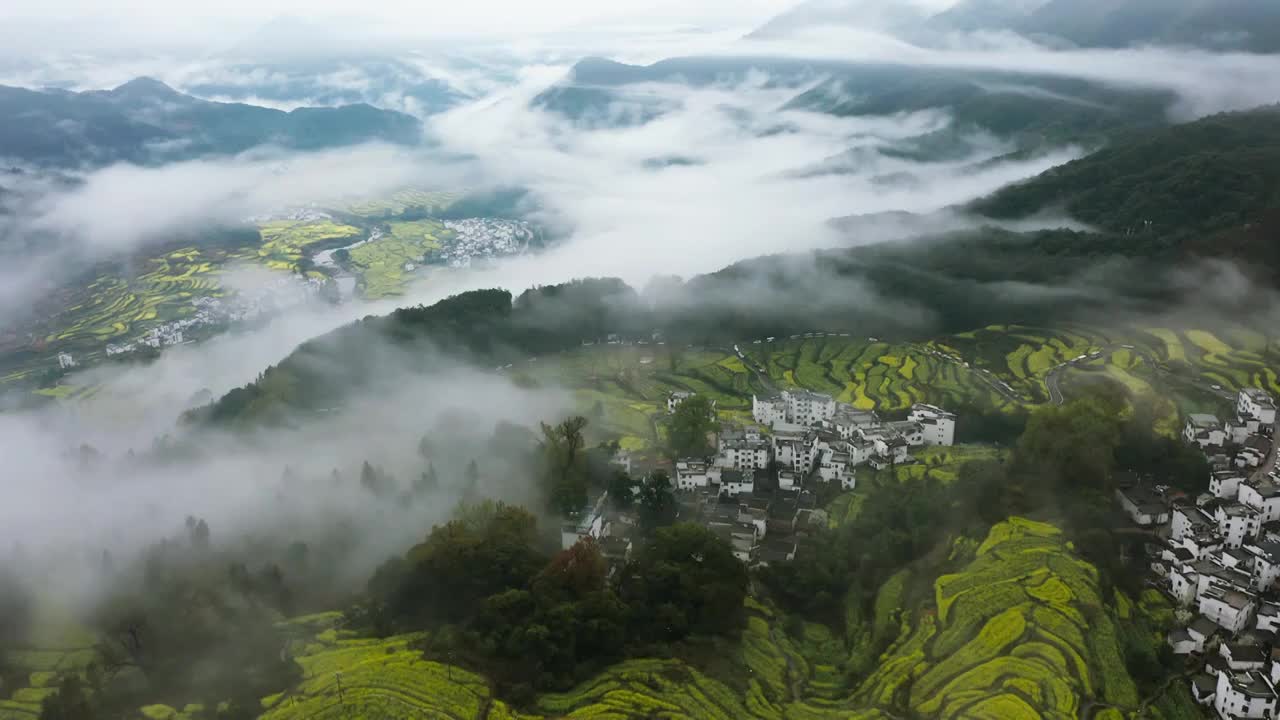 江西婺源江岭景区油菜花梯田云海风光航拍合集1视频素材