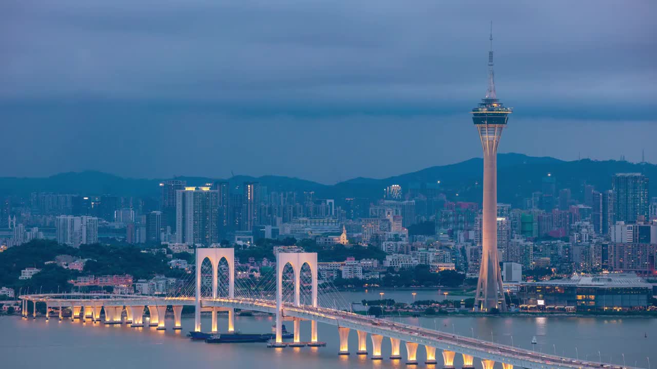 8K澳门半岛旅游塔城市日转夜延时视频素材