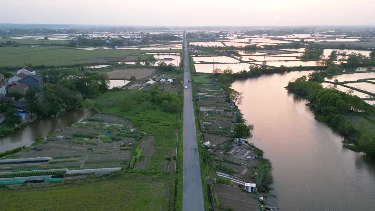 航拍乡村公路及田园暮色视频素材