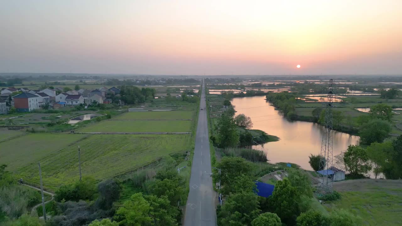 航拍乡村公路及田园暮色视频素材