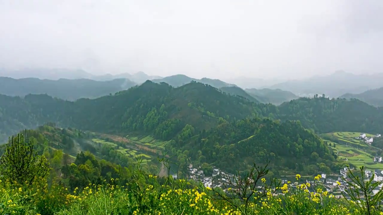 安徽黄山歙县皖南徽州石潭春天云海油菜花自然风光延时摄影高清视频视频素材