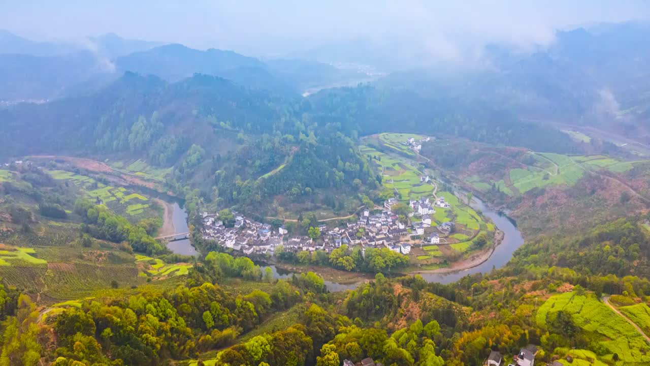 航拍安徽黄山歙县皖南徽州石潭春天云海油菜花延时摄影高清视频视频素材