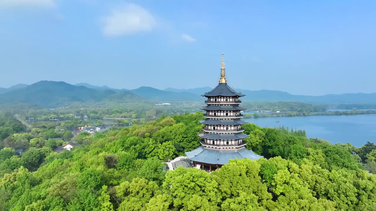 航拍春天晴朗天气的杭州西湖雷峰塔景区风景视频素材