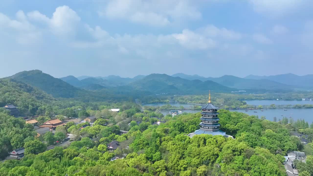 航拍春天晴朗天气的杭州西湖雷峰塔景区风景视频素材