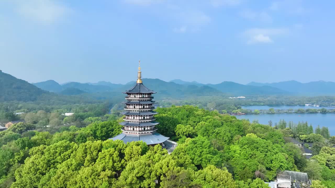 航拍春天晴朗天气的杭州西湖雷峰塔景区风景视频素材