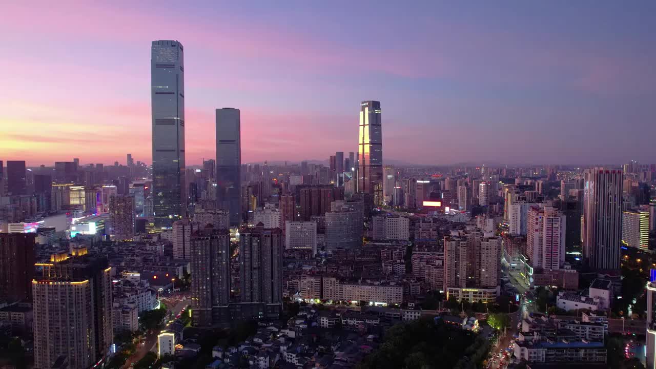 湖南长沙市城市地标ifs国金中心日落夕阳4k航拍风光视频素材