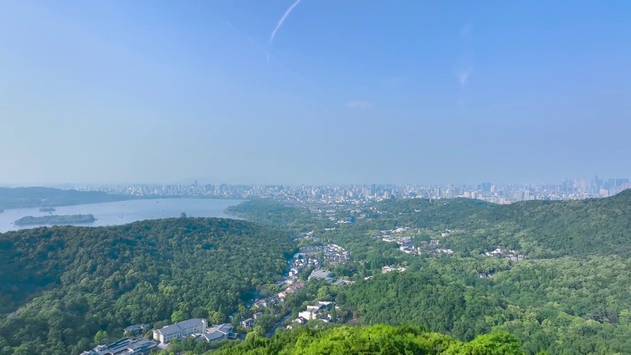 春天晴朗的下午航拍杭州西湖群山风景视频素材