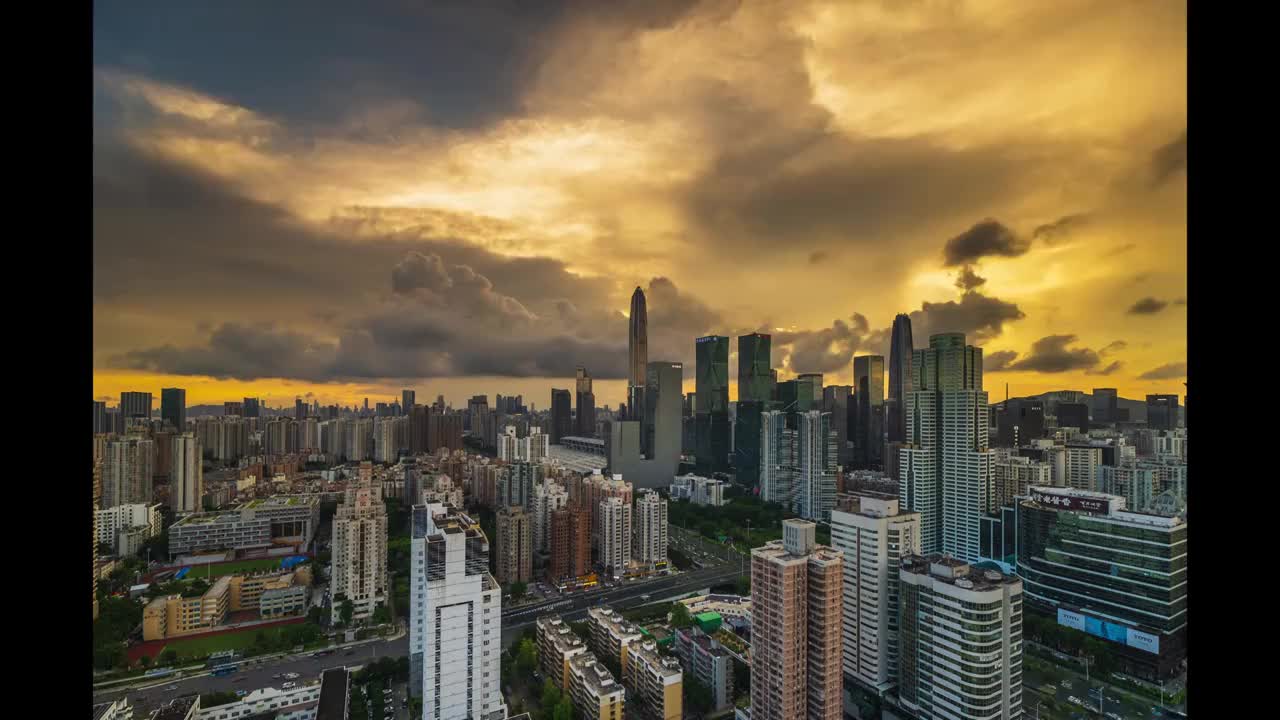 日落晚霞映衬下的城市建筑风光视频素材