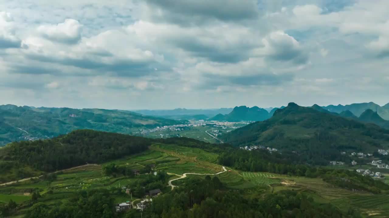 航拍山脉乡村蓝天白云延时视频素材