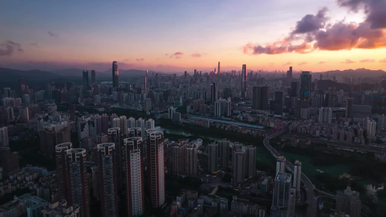 延时航拍深圳国际大都市城市日落晚霞城市高楼背景视频素材