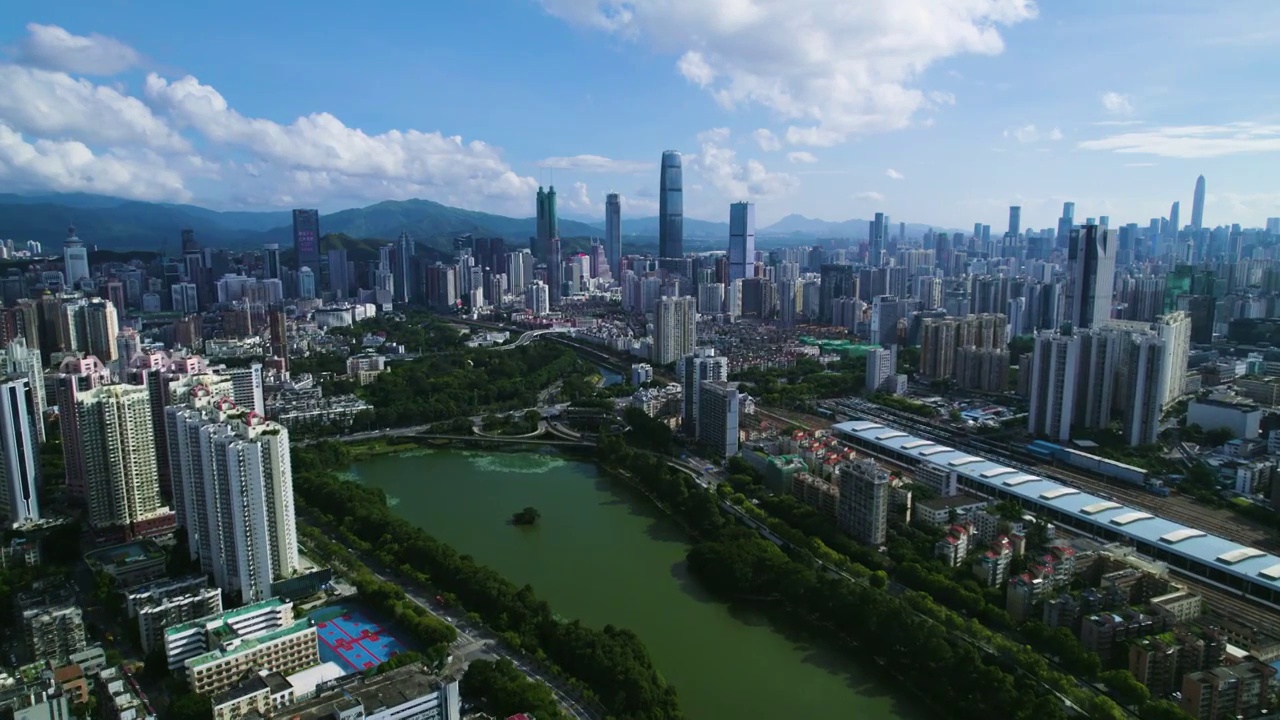 航拍深圳高楼建筑摩天大楼蓝天白云背景视频素材