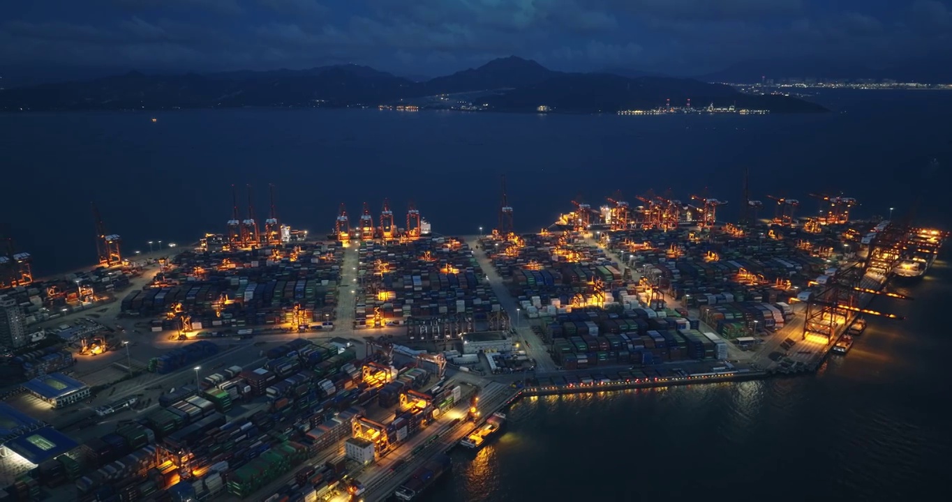 广东深圳蛇口港黄昏夜景航拍视频素材