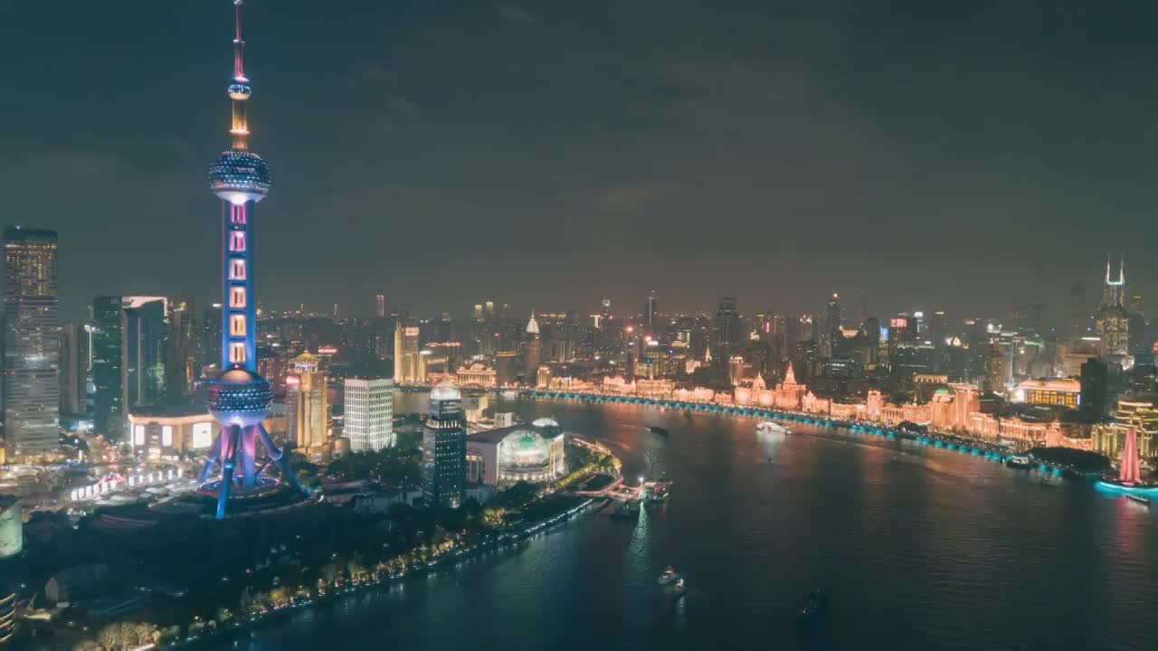 航拍上海黄浦江沿岸建筑群夜景延时视频素材