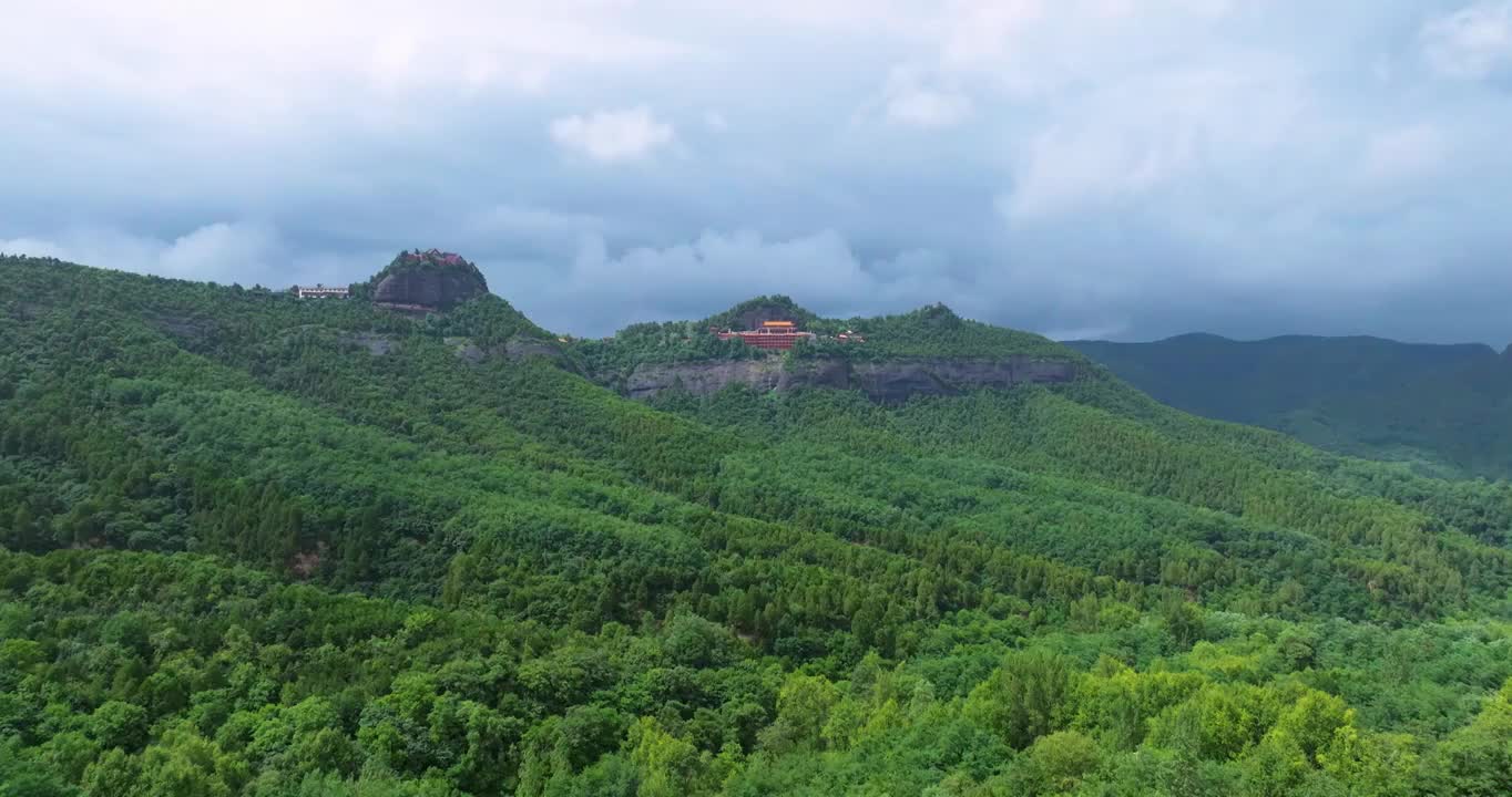 航拍夏季陕西铜川照金丹霞地貌和大香山寺风光视频素材