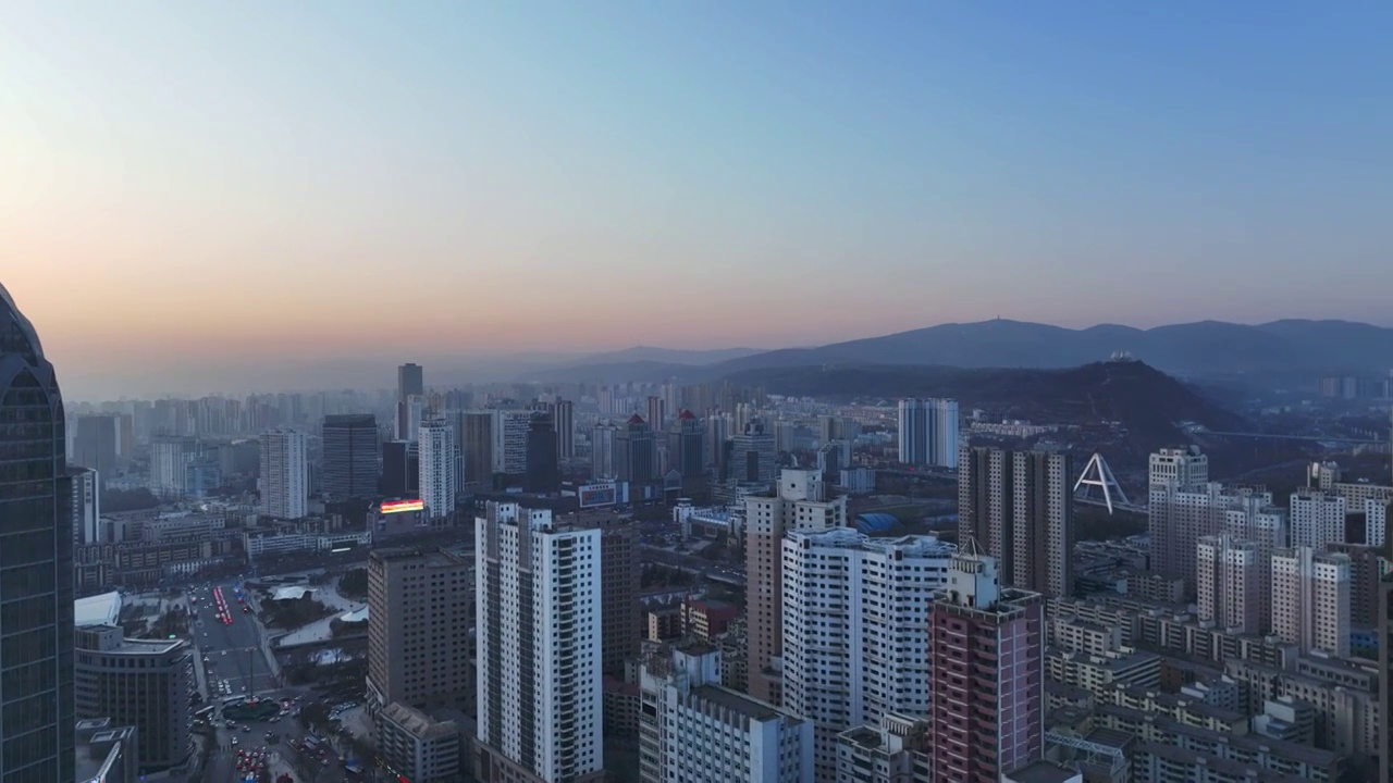 航拍青海西宁城西区夕阳城市风光视频素材