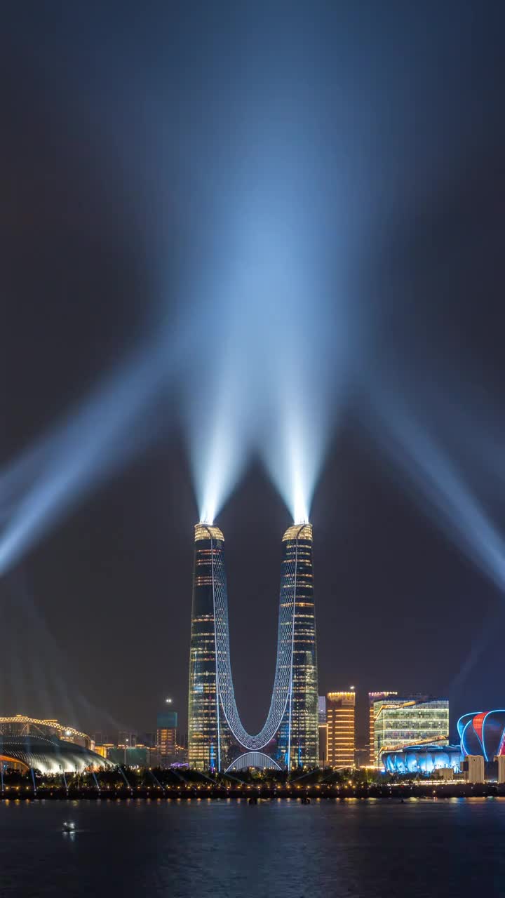 浙江杭州钱塘江南岸城市天际线夜景灯光秀延时视频素材