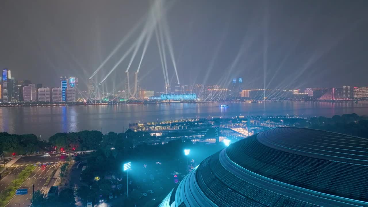 杭州亚运会主场馆夜景灯光秀航拍视频素材