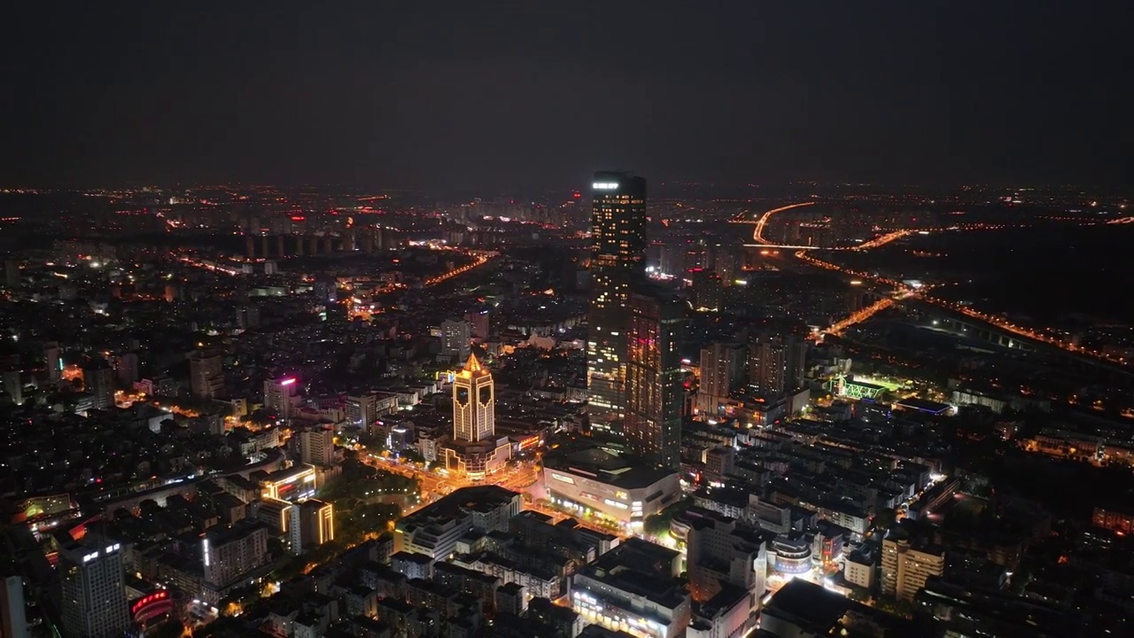 镇江夜景航拍苏宁大厦视频素材