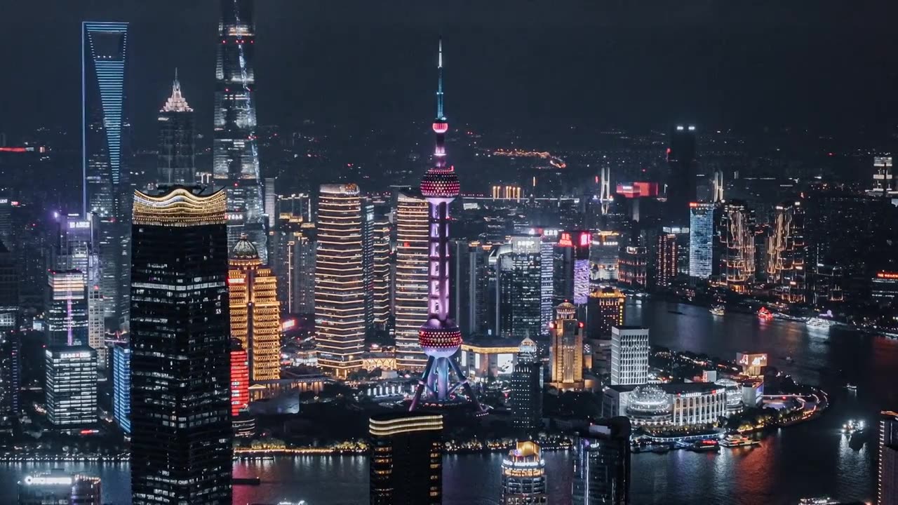 航拍上海白玉兰广场和陆家嘴夜景视频素材