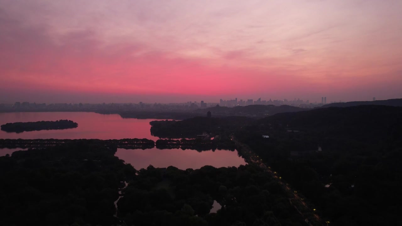 杭州西湖浴鹄湾无人机航拍朝霞日出风光视频素材