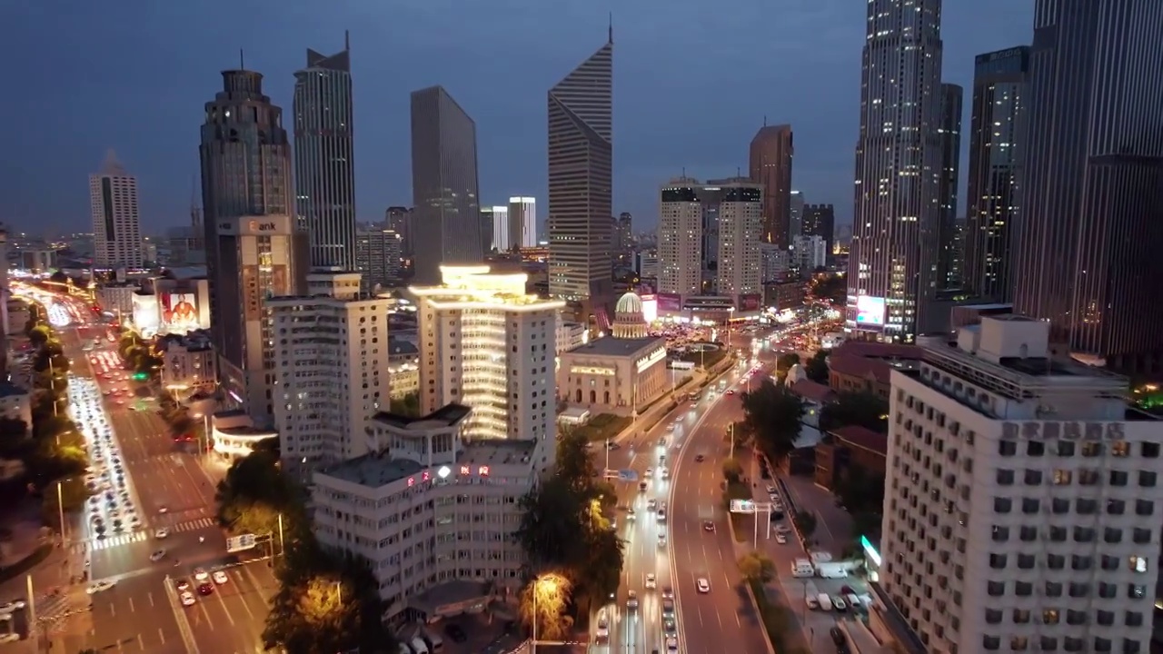 天津市区音乐厅小白楼商圈城市建筑街道夜景航拍视频素材