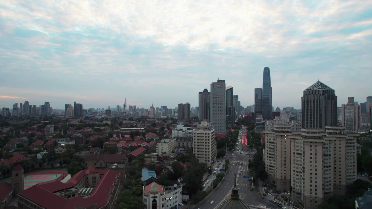 天津市区音乐厅小白楼商圈城市建筑街道夜景航拍视频素材