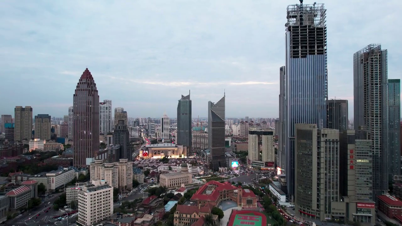 天津市区音乐厅小白楼商圈城市建筑街道夜景航拍视频素材