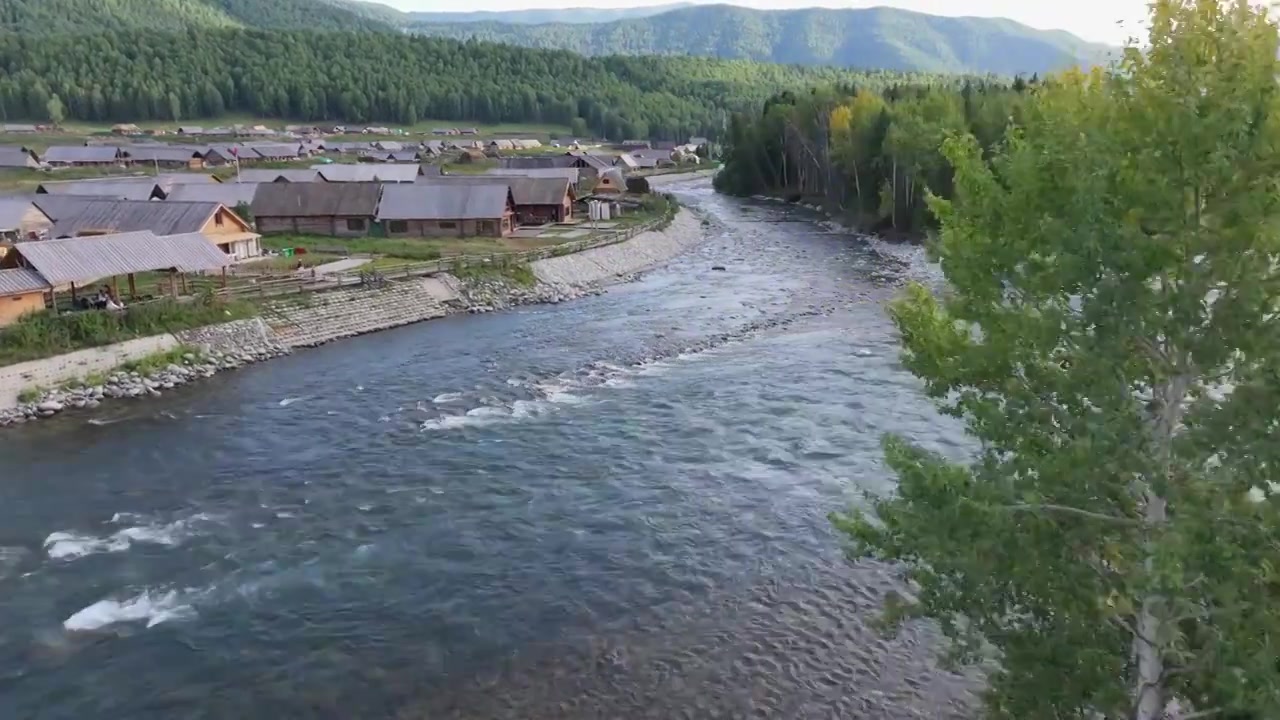 航拍夏天的新疆禾木村风景视频素材