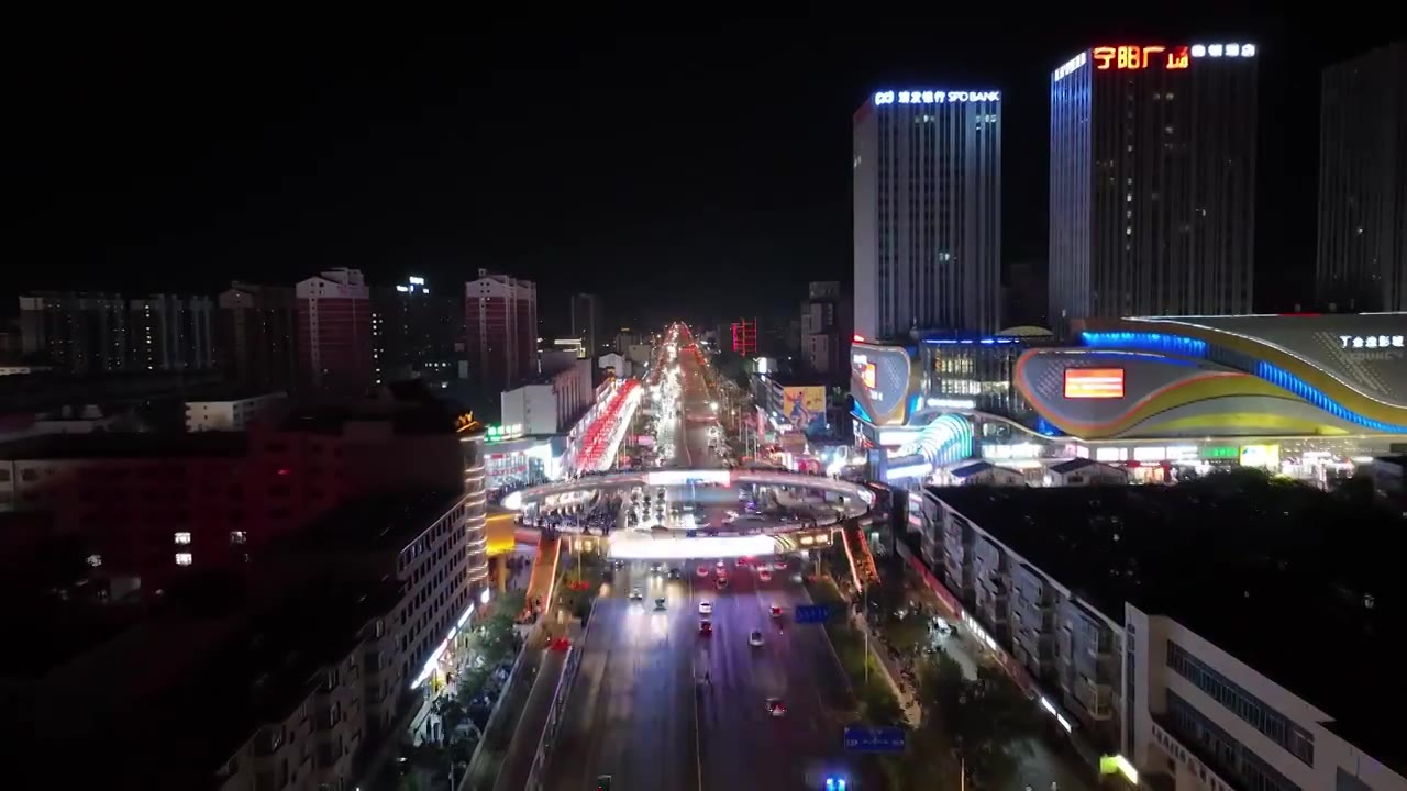 航拍宁夏银川怀远街夜市十字路口车流延时视频素材